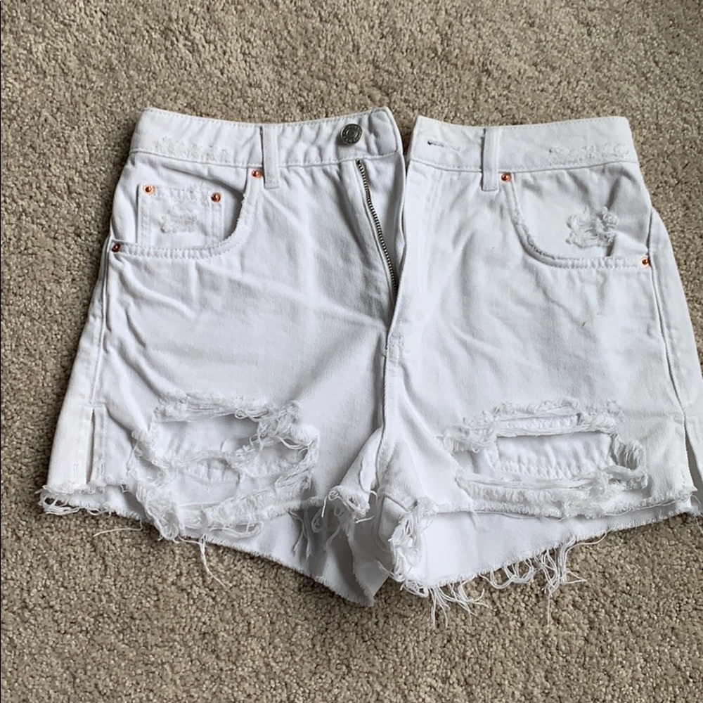 High waisted white ripped jean shorts